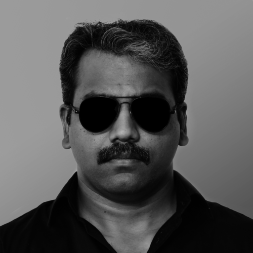 Sandeep Chandrika with glasses